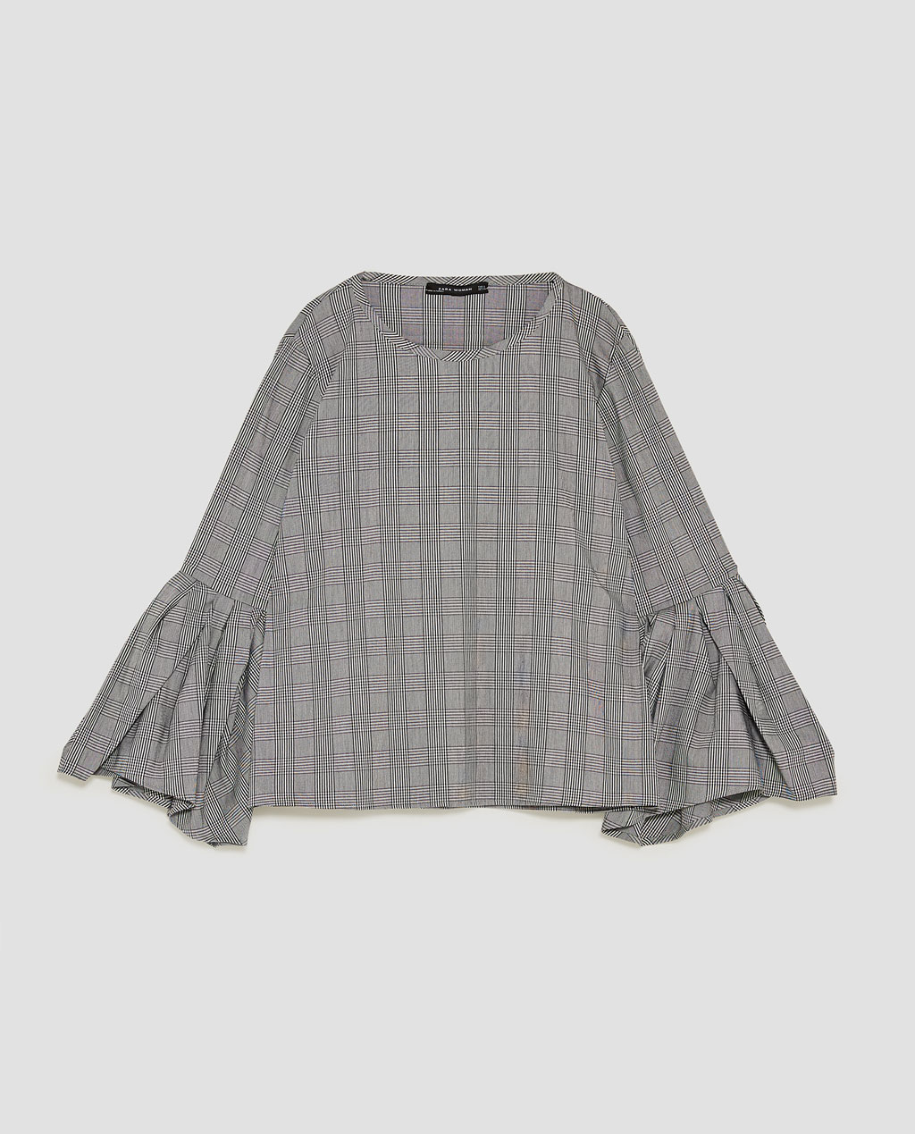 プリーツ入りチェック柄トップス